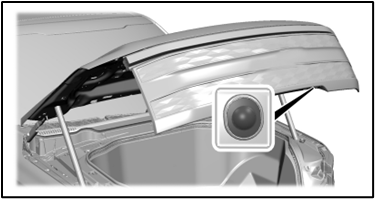 Frunk control button shown on bottom of frunk lid.