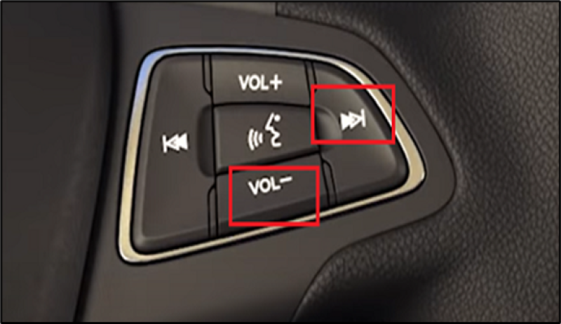 Volume Down and Seek Right buttons on steering wheel.