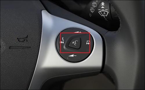 Steering column controls with Push-to-Talk button highlighted