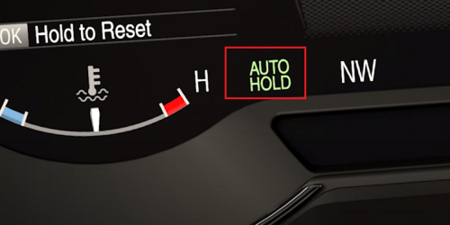 AUTO HOLD light illuminated on the instrument cluster