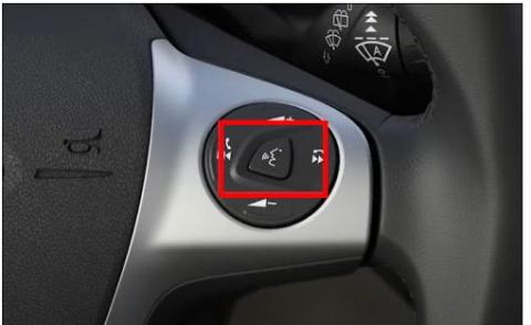 Steering wheel with SYNC 3 Voice Control button highlighted.