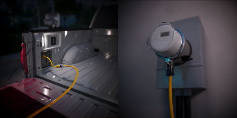 F-150 Powerboost Hybrid and a meter color connected via a yellow cable.